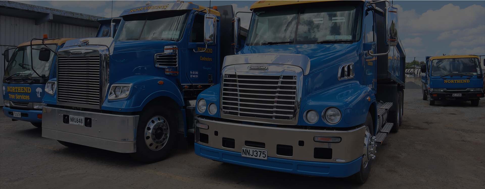 trucks parked in truckyard